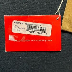 Dooney & Bourke Tan Suede Clutch